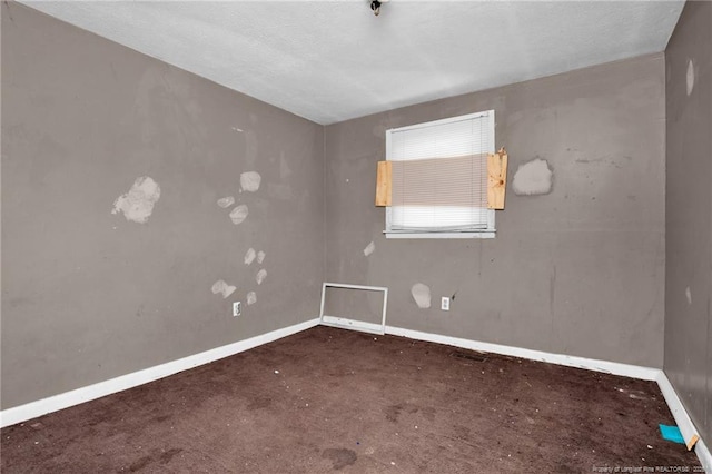 6200 Arabia Rd, Lumber Bridge, NC 28357 - spare room featuring carpet flooring and baseboards