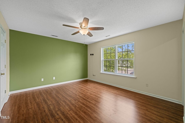 518 Clearfield Dr, Durham, NC 27703 - unfurnished room featuring wood finished floors, ceiling fan, and a textured ceiling