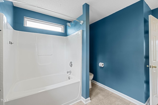 518 Clearfield Dr, Durham, NC 27703 - bathroom with  shower combination, tile patterned floors, and a textured ceiling