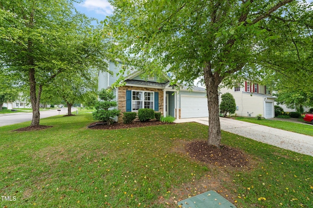 518 Clearfield Dr, Durham, NC 27703 - view of front facade with driveway, a front yard, and an attached garage