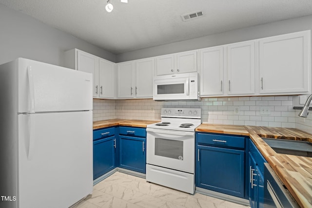 518 Clearfield Dr, Durham, NC 27703 - kitchen with butcher block counters, white appliances, blue cabinets, and a textured ceiling