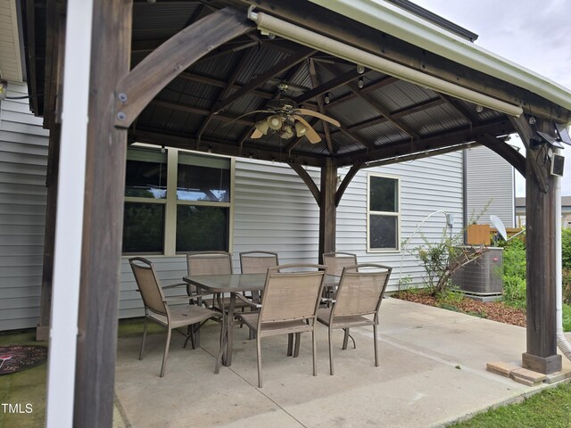 2511 Dalmahoy Ln, Fuquay Varina, NC 27526 - view of patio / terrace featuring a gazebo, a ceiling fan, outdoor dining area, and central AC unit