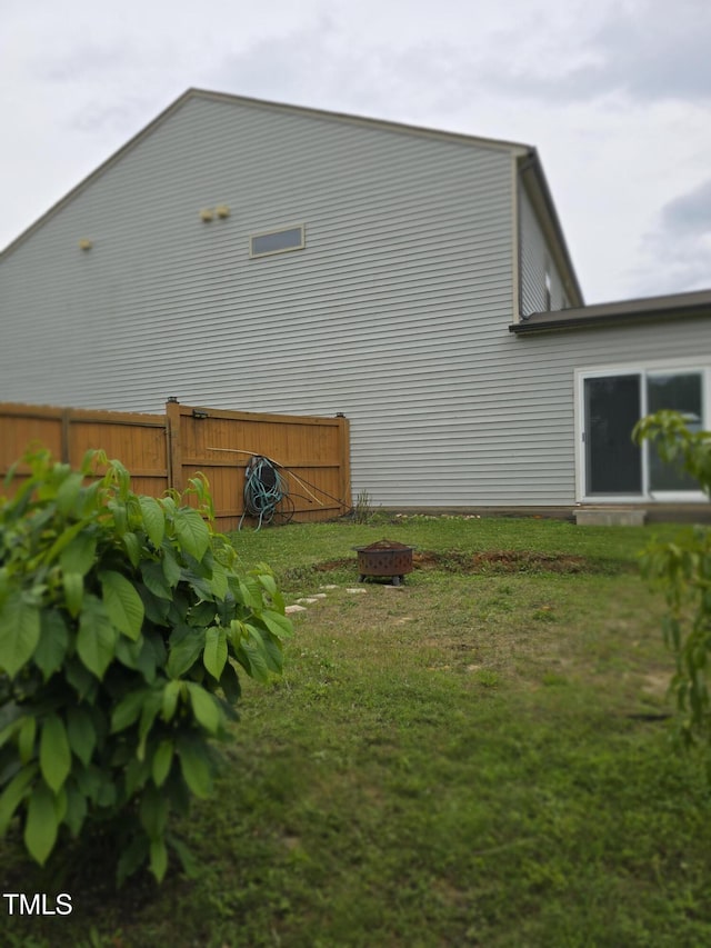 2511 Dalmahoy Ln, Fuquay Varina, NC 27526 - view of side of home featuring an outdoor fire pit