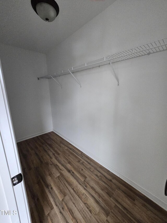 2511 Dalmahoy Ln, Fuquay Varina, NC 27526 - spacious closet with dark wood-style flooring