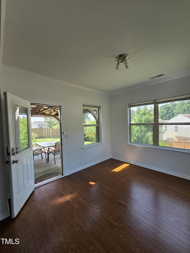 2511 Dalmahoy Ln, Fuquay Varina, NC 27526 - empty room with ornamental molding, hardwood / wood-style floors, and baseboards