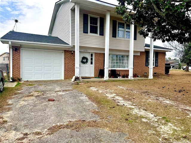 6532 Kemper Ct, Fayetteville, NC 28303 - view of front of property featuring asphalt driveway, brick siding, and a garage