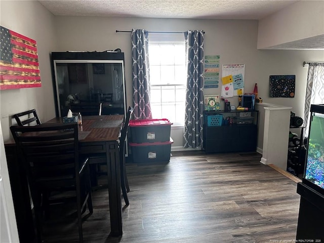 6532 Kemper Ct, Fayetteville, NC 28303 - dining room featuring wood finished floors and a textured ceiling