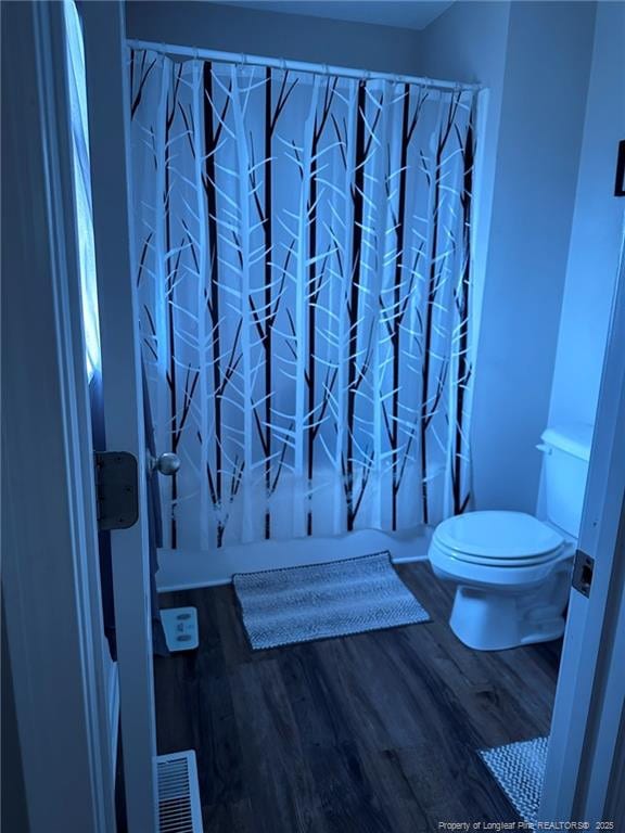 6532 Kemper Ct, Fayetteville, NC 28303 - bathroom featuring toilet and wood finished floors
