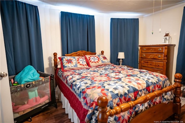 208 W Thompson St E, Fairmont, NC 28340 - bedroom with wood finished floors and crown molding