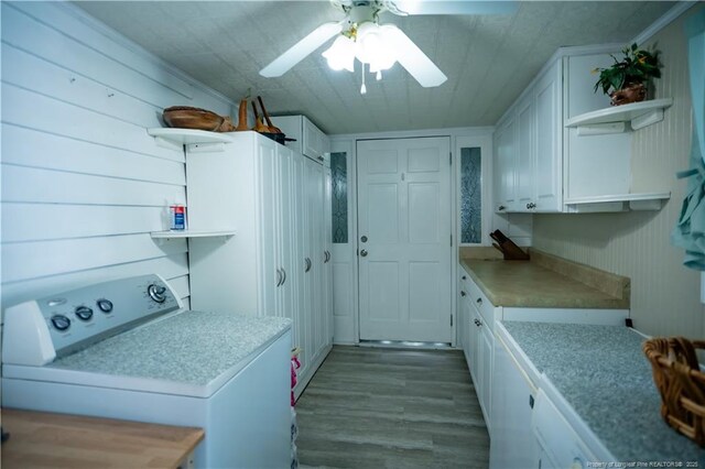 208 W Thompson St E, Fairmont, NC 28340 - laundry room featuring washer / dryer, cabinet space, wood finished floors, and a ceiling fan