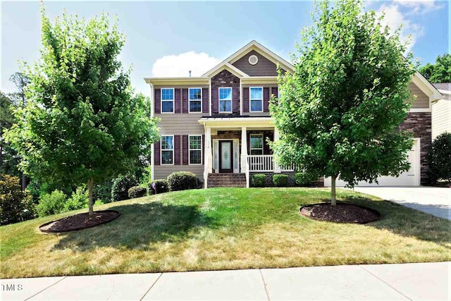112 Briarfield Dr, Apex, NC 27502 - view of front of home featuring a porch, a front yard, and driveway