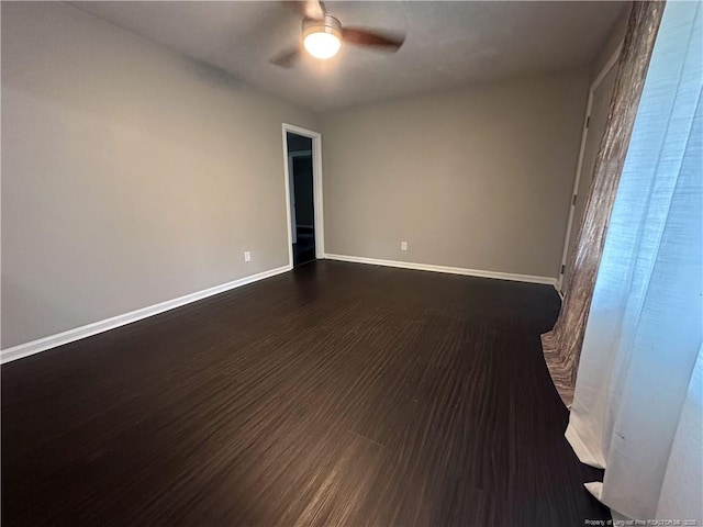 2013 Mango Cir, Fayetteville, NC 28304 - unfurnished room featuring ceiling fan, dark wood-style flooring, and baseboards