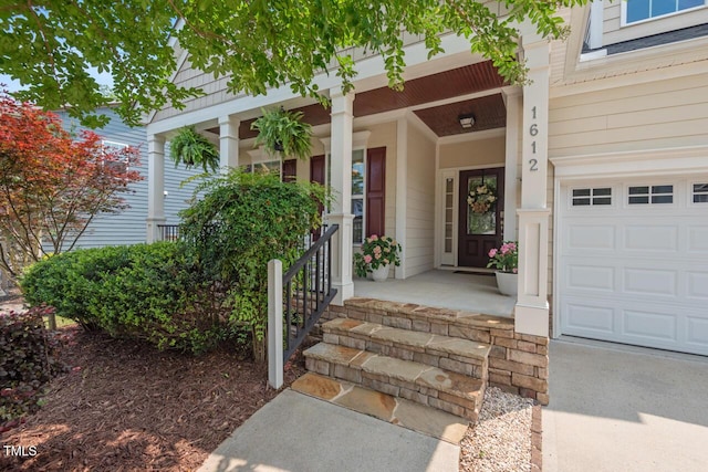 1612 Old Bramble Ln, Fuquay Varina, NC 27526 - view of exterior entry featuring a garage and covered porch