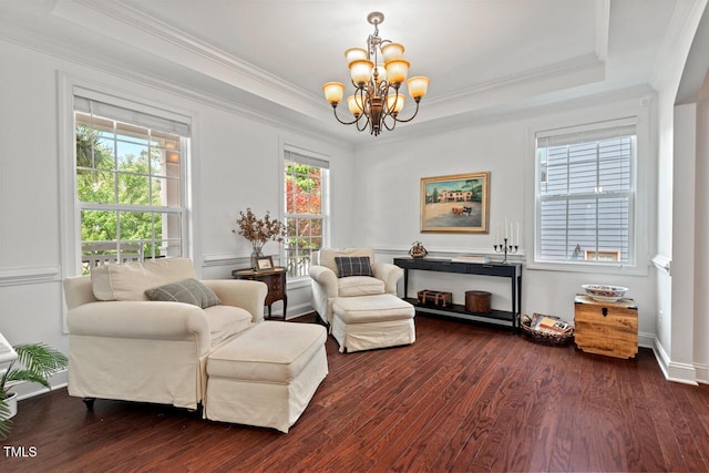 1612 Old Bramble Ln, Fuquay Varina, NC 27526 - living area with a chandelier, dark wood-type flooring, crown molding, and a tray ceiling