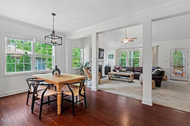 1612 Old Bramble Ln, Fuquay Varina, NC 27526 - dining room featuring healthy amount of natural light, ornamental molding, baseboards, ceiling fan, and dark wood-style floors