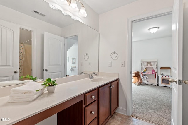 1612 Old Bramble Ln, Fuquay Varina, NC 27526 - bathroom with vanity and baseboards