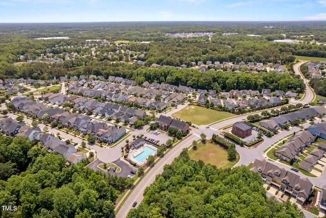 1612 Old Bramble Ln, Fuquay Varina, NC 27526 - aerial view of residential area featuring a heavily wooded area