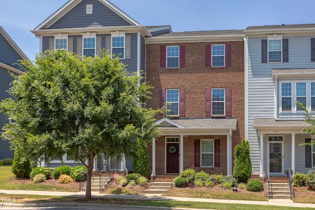 5908 Giddings St, Raleigh, NC 27616 - view of front of property featuring brick siding and covered porch