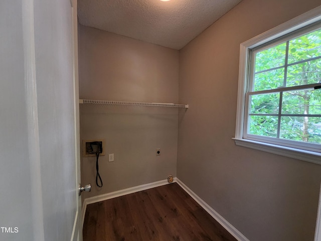 4903 Bridgewood Dr, Durham, NC 27713 - washroom with electric dryer hookup, dark wood finished floors, baseboards, a textured ceiling, and washer hookup