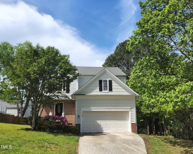 4903 Bridgewood Dr, Durham, NC 27713 - traditional home with brick siding, driveway, and a garage