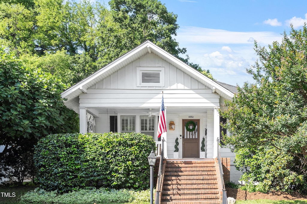 2225 Creston Rd, Raleigh, NC 27608 - bungalow featuring board and batten siding and a porch