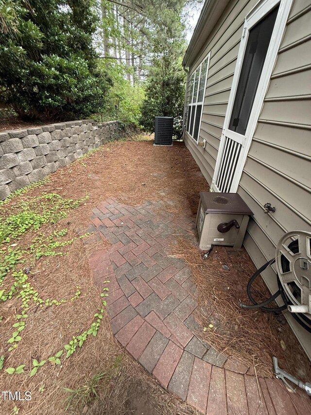 1017 Red Hat Ln, Durham, NC 27713 - view of patio / terrace with central AC