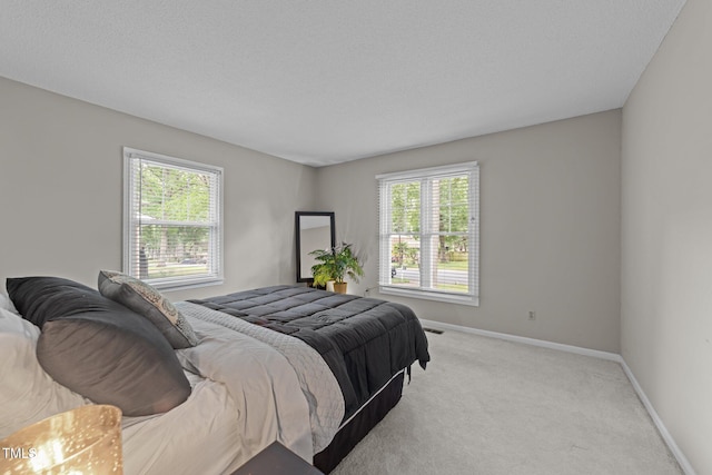 1040 Ivy Ln, Cary, NC 27511 - bedroom with multiple windows and carpet
