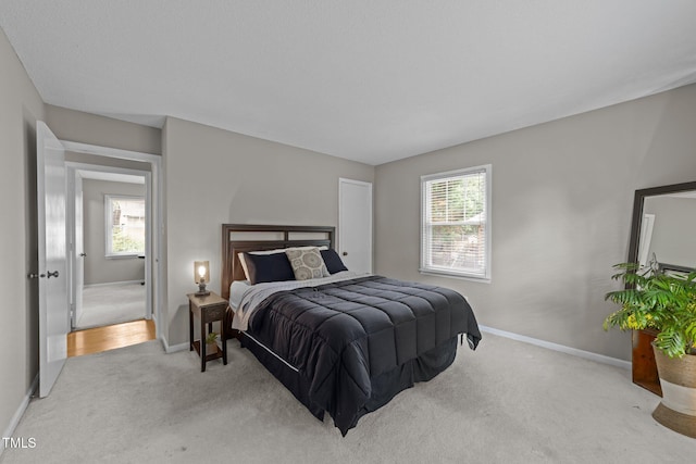 1040 Ivy Ln, Cary, NC 27511 - carpeted bedroom featuring baseboards