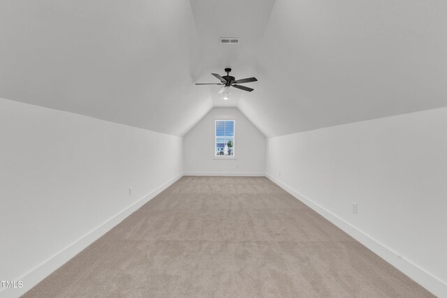 121 Nate Ct, Wake Forest, NC 27587 - additional living space featuring lofted ceiling, light carpet, a ceiling fan, and baseboards