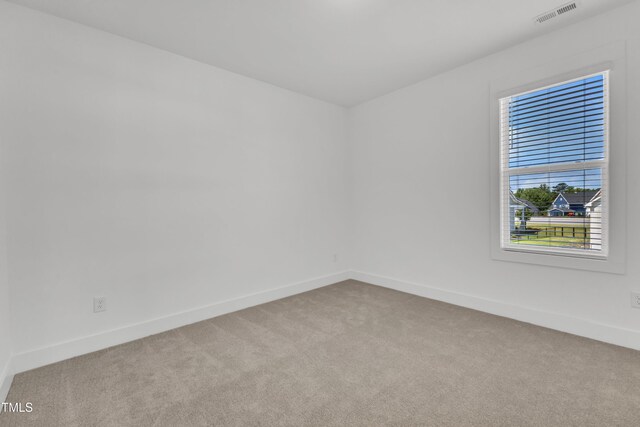 121 Nate Ct, Wake Forest, NC 27587 - carpeted empty room featuring baseboards