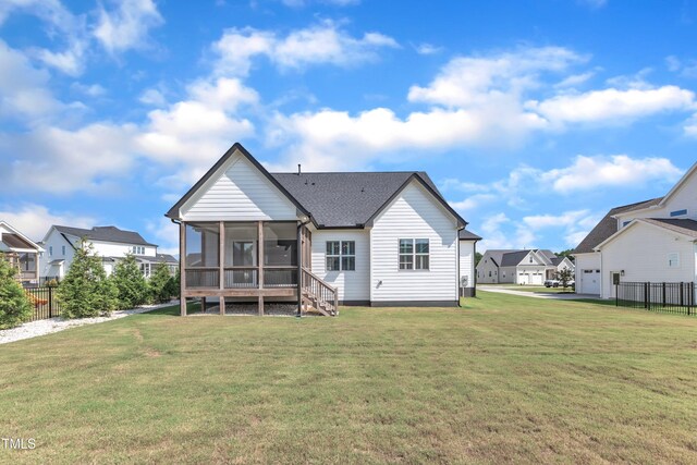121 Nate Ct, Wake Forest, NC 27587 - rear view of property featuring a sunroom, a residential view, and roof with shingles