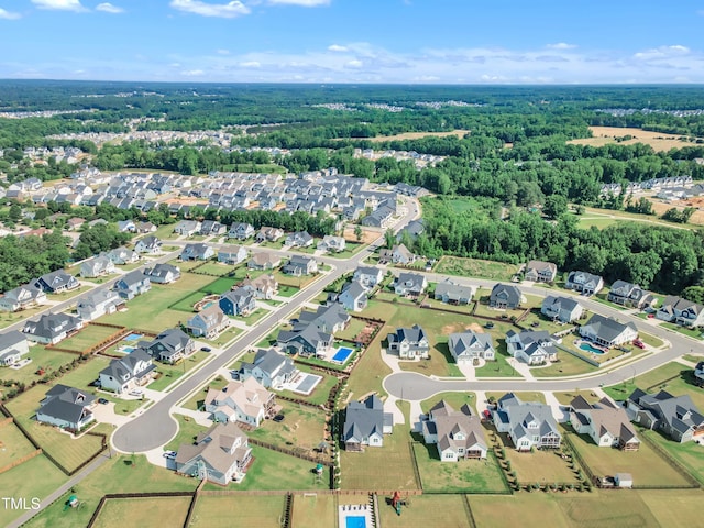 121 Nate Ct, Wake Forest, NC 27587 - aerial view of property and surrounding area with nearby suburban area and a forest