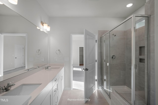 455 Beacon Hill Rd # 28, Lillington, NC 27546 - full bathroom with double vanity, a stall shower, tile patterned floors, recessed lighting, and baseboards