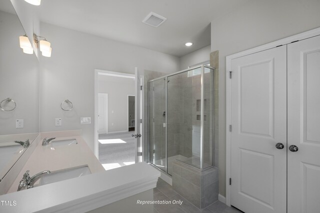 455 Beacon Hill Rd # 28, Lillington, NC 27546 - full bathroom with a stall shower, double vanity, tile patterned floors, baseboards, and recessed lighting