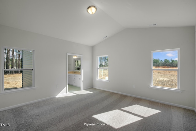 455 Beacon Hill Rd # 28, Lillington, NC 27546 - unfurnished room featuring light colored carpet, vaulted ceiling, and baseboards