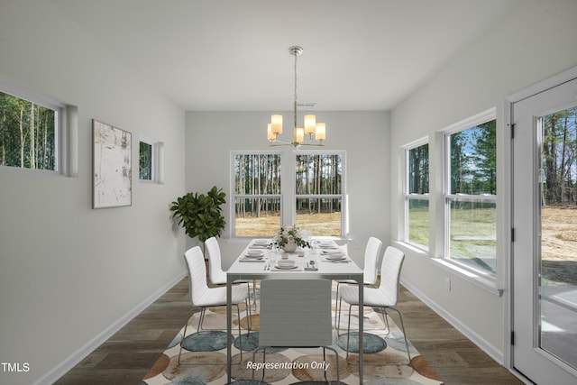 455 Beacon Hill Rd # 28, Lillington, NC 27546 - dining area featuring a chandelier, dark wood-style floors, and baseboards