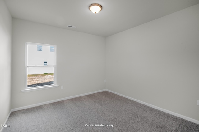 455 Beacon Hill Rd # 28, Lillington, NC 27546 - carpeted spare room featuring baseboards