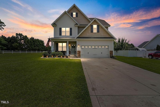 15 Scuppernong Ln, Lillington, NC 27546 - craftsman-style house featuring driveway, a garage, board and batten siding, a porch, and stone siding
