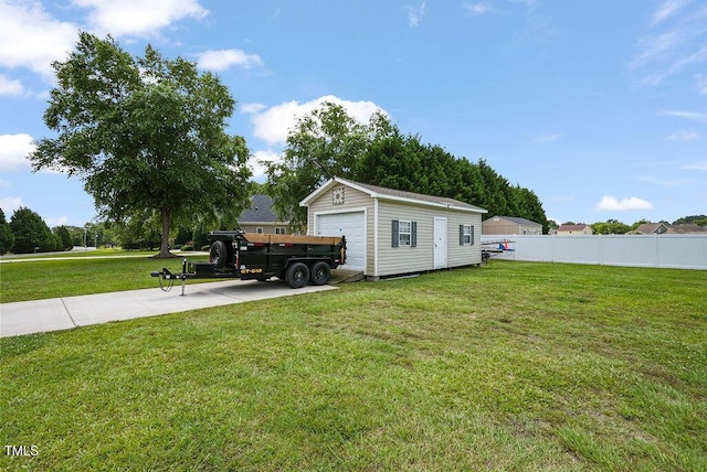 15 Scuppernong Ln, Lillington, NC 27546 - view of yard featuring an outdoor structure and a garage