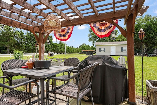 15 Scuppernong Ln, Lillington, NC 27546 - view of patio featuring outdoor dining area, a pergola, and grilling area