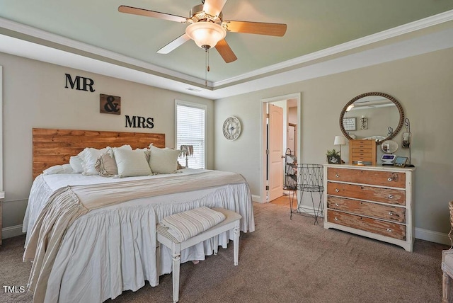 15 Scuppernong Ln, Lillington, NC 27546 - carpeted bedroom featuring baseboards, a raised ceiling, crown molding, and a ceiling fan