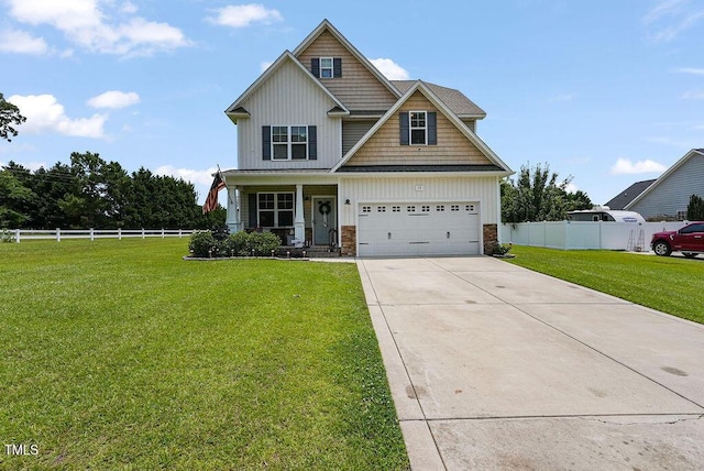 15 Scuppernong Ln, Lillington, NC 27546 - craftsman inspired home with driveway, a porch, and stone siding