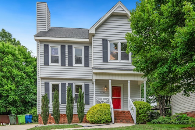 3405 E Jameson Rd, Raleigh, NC 27604 - view of front of property featuring a chimney, a porch, and a shingled roof