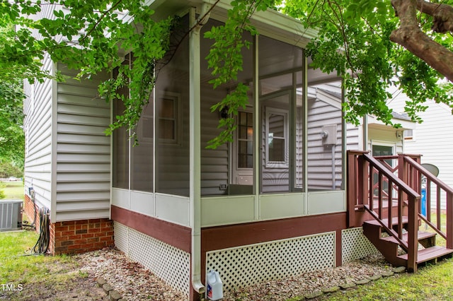 3405 E Jameson Rd, Raleigh, NC 27604 - view of property exterior with a sunroom and central air condition unit