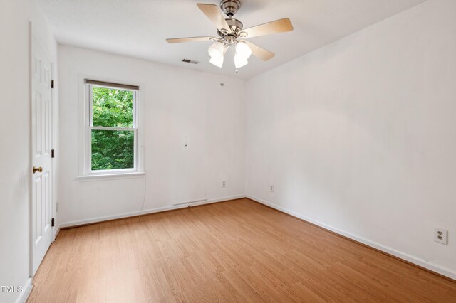 3405 E Jameson Rd, Raleigh, NC 27604 - unfurnished room featuring light wood-style flooring, baseboards, and ceiling fan