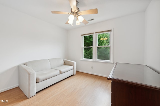 3405 E Jameson Rd, Raleigh, NC 27604 - living area featuring light wood-style floors, baseboards, and a ceiling fan