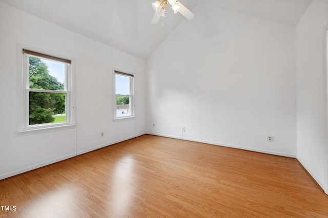 3405 E Jameson Rd, Raleigh, NC 27604 - empty room featuring plenty of natural light, a ceiling fan, light wood-style floors, baseboards, and high vaulted ceiling