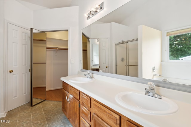 3405 E Jameson Rd, Raleigh, NC 27604 - bathroom featuring a stall shower, double vanity, a bath, and a walk in closet