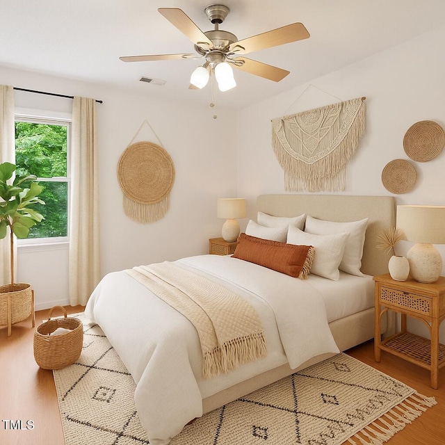 3405 E Jameson Rd, Raleigh, NC 27604 - bedroom with wood finished floors and a ceiling fan