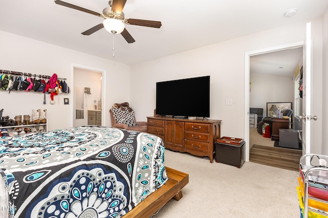 18 Hunter Fox Trl, Angier, NC 27501 - carpeted bedroom featuring a ceiling fan and connected bathroom